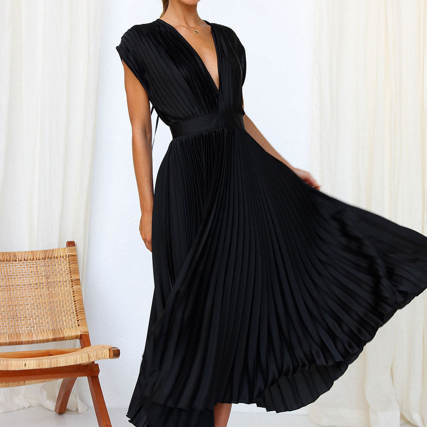 Grace - Flowy Women's Wedding Guest Dress with Deep V-Neck and Pleated Midi Skirt