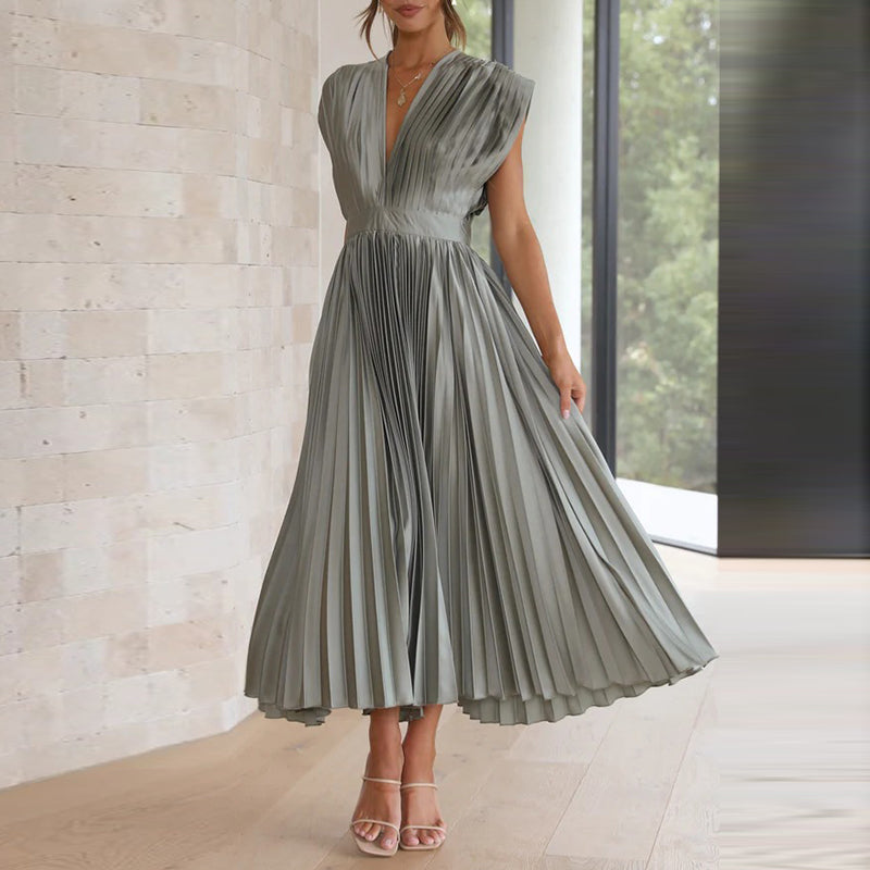 Grace - Flowy Women's Wedding Guest Dress with Deep V-Neck and Pleated Midi Skirt
