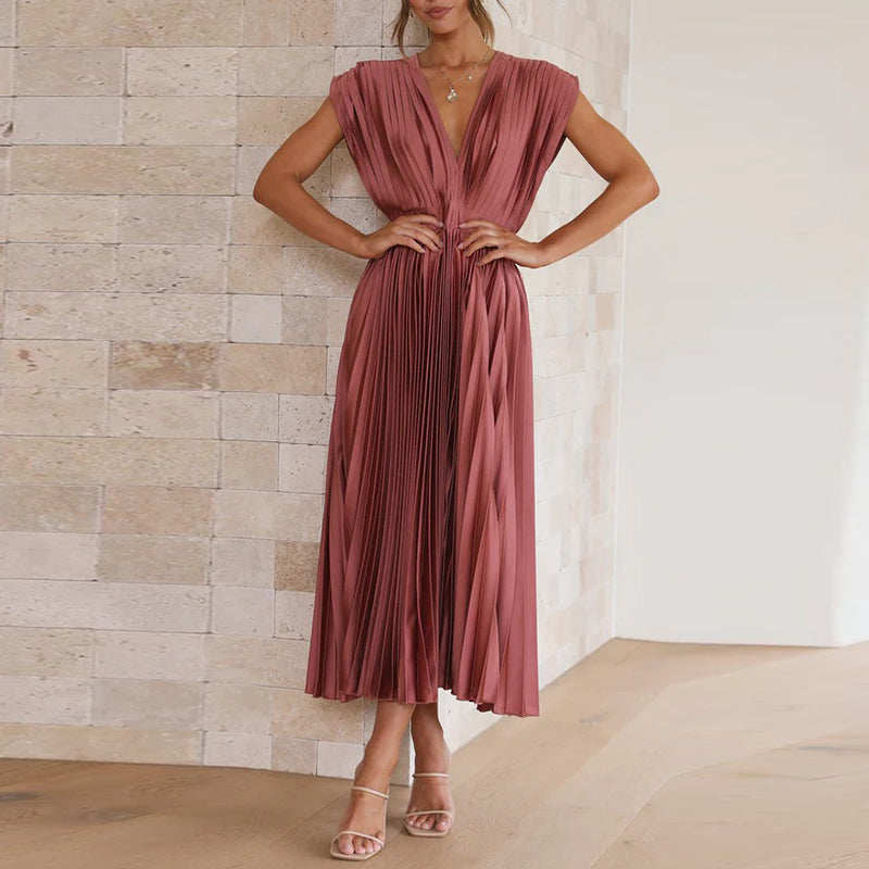 Grace - Flowy Women's Wedding Guest Dress with Deep V-Neck and Pleated Midi Skirt