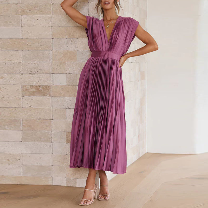 Grace - Flowy Women's Wedding Guest Dress with Deep V-Neck and Pleated Midi Skirt
