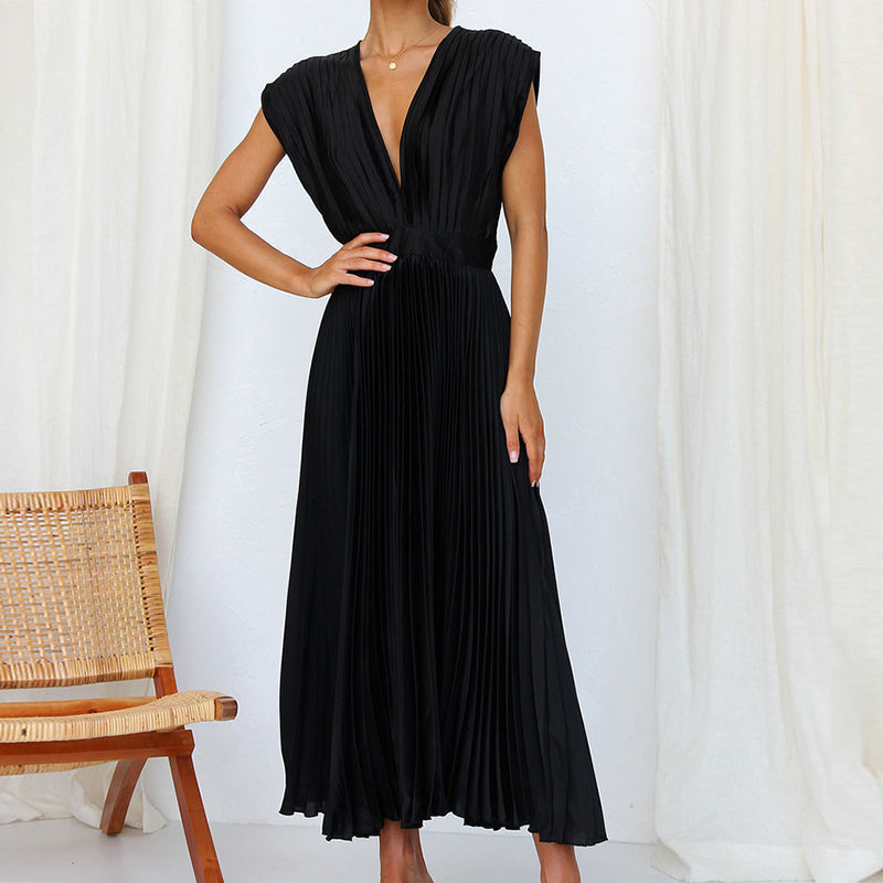 Grace - Flowy Women's Wedding Guest Dress with Deep V-Neck and Pleated Midi Skirt